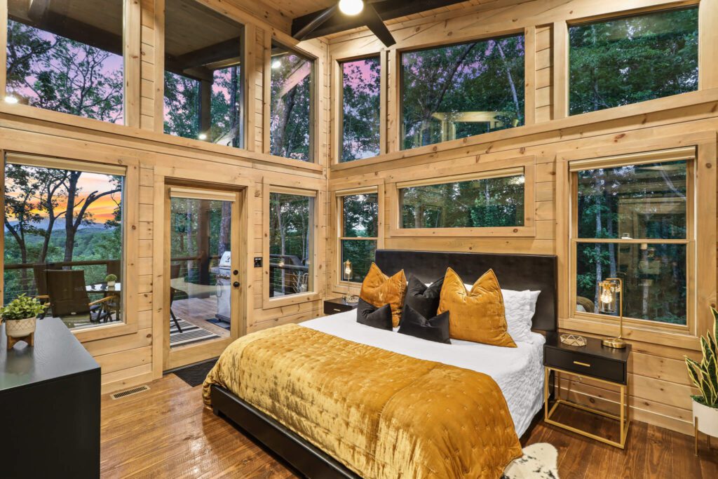 king size bedroom in a luxury cabin rental in blue ridge, georgia - boujee lodge